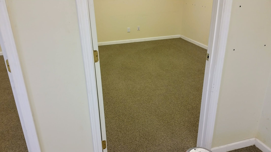 This picture shows the carpeting in the office area after being cleaned.