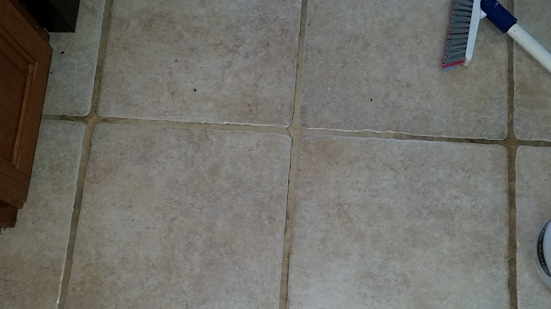 Picture of a test area on tile and grout to determine the cleaning solution needed for the job. By Absolutely Kleen in Daphne, AL.