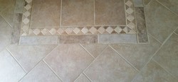 Picture of tile and grout after cleaning by Absolutely Kleen in Fairhope, AL