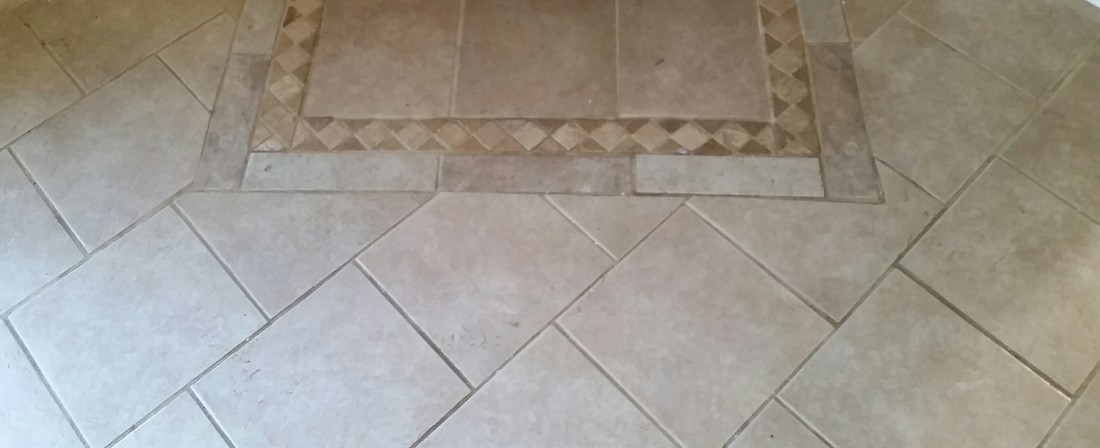 Picture of tile and grout before cleaning