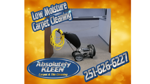 Picture of a Low Moisture Carpet Cleaning machine used by Absolutely Kleen of Daphne, Alabama with our logo and phone number ( 251-626-6227 ) on it. 